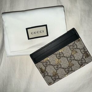 Gucci gold bee card holder